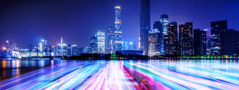 Image of a city scape with fiber optical lines in the foreground